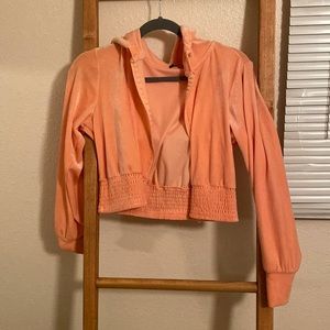 Medium Jolie and Joy track shirt.